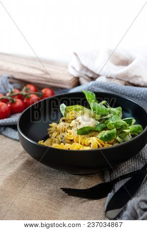 Radiatori pasta in a creamy tomato parmesan cheese sauce