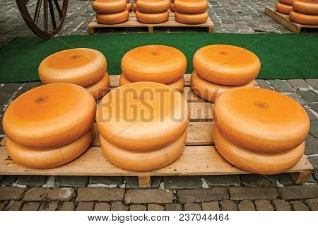 Gouda, Southern Netherlands - June 29, 2017. Close-up Of Cheeses Stacks For Sale At The Market Squar