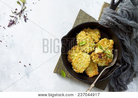 Vegan Vegetable Fritters On A Background Of Gray Stone Or Slate. Fried Vegetarian Cutlets Or Pancake