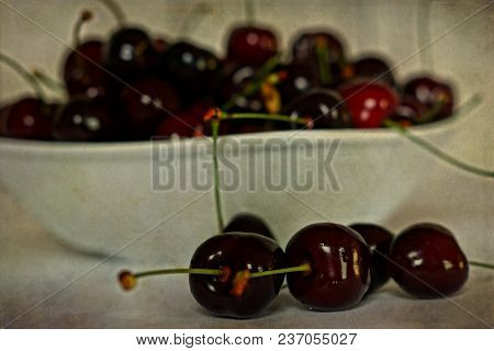 Beautiful Juicy Fresh Summer Cherries In A White Bowl On A Vintege Background