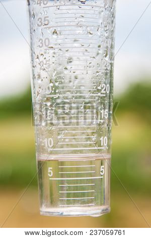 Meteorology With Rain Gauge In Garden
