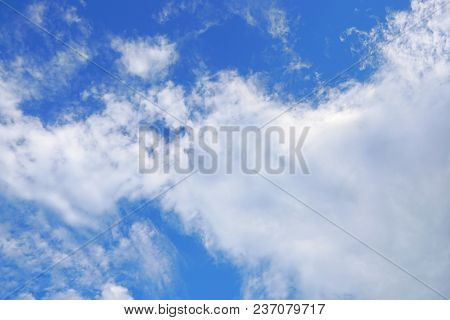 Beautiful Nature Blue Sky With Clouds, Sky Clouds Background, Cloudscape Concept. Space For Text In 