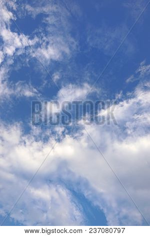 Beautiful Nature Blue Sky With Clouds, Sky Clouds Background, Cloudscape Concept. Space For Text In 