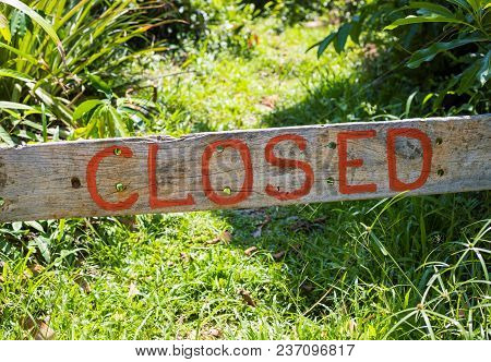 Wooden Plaque With The Inscription Closed. Closed Sign On Rustic Wood Board. Rustic Timber Sign With