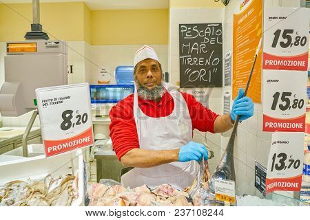 ROME, ITALY - CIRCA NOVEMBER 2017: indoor portrait of staff in Conad supermarket in Rome.