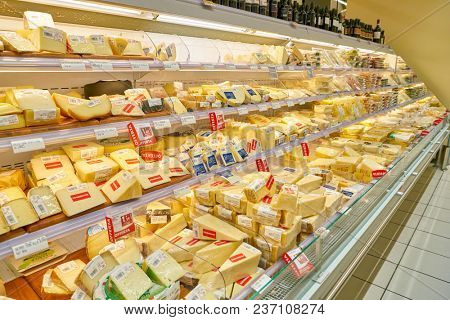 ROME, ITALY - CIRCA NOVEMBER 2017: cheese on display in Conad supermarket in Rome.