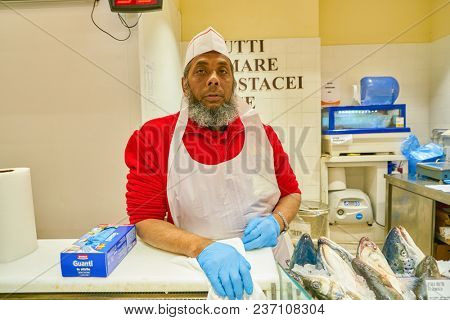 ROME, ITALY - CIRCA NOVEMBER 2017: indoor portrait of staff in Conad supermarket in Rome.