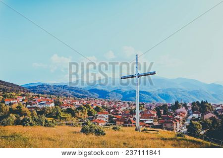 Sunset In Balkan Mountains, Dobrinishte City. Europe, Bulgaria, Dodrinishte Town Panoramic View.
