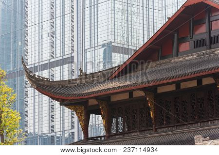 Daci Buddhist Temple Against Modern Building In Chengdu, China