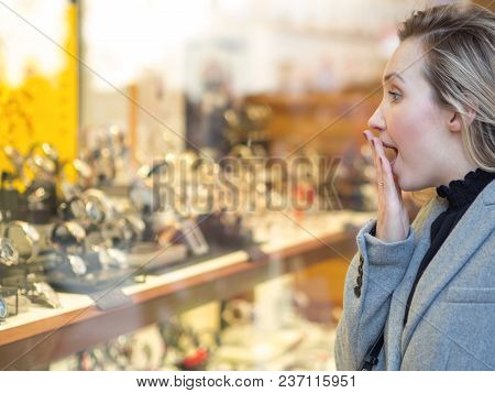 Surprised Woman Looking At A Shop Window