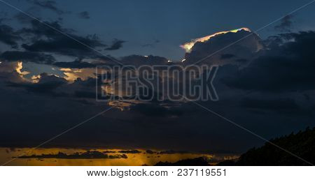 Cloud Iridescence, Rainbow Irisation Over Golden Sea Coast Line.