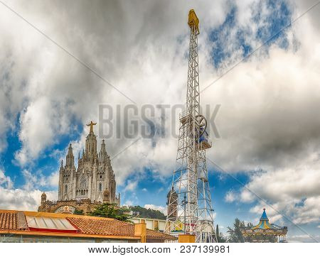 Barcelona - August 12: Tibidabo Amusement Park And Church Of The Sacred Heart, Barcelona, Catalonia,