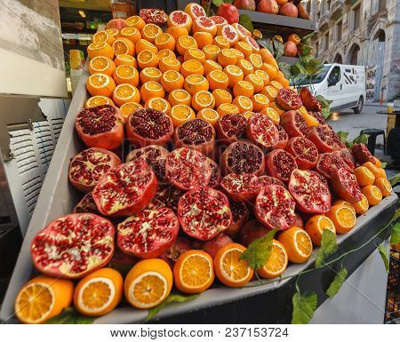 Apples Oranges And Grenades Colorful Fresh Fruit Market On Istanbul Streets. A Lot Of Fruits .