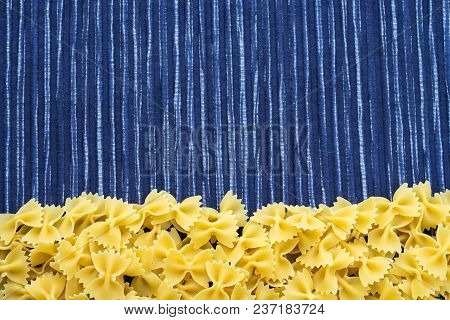 Farfalle Raw Farfallini Beautiful Decomposed Pasta With A Bottom On A Rustic Striped Blue White Text