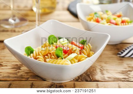 Bowls With Delicious Pasta Primavera On Table