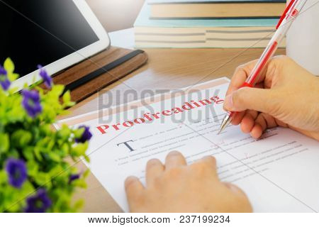 Proofreading Paper On Table In Office For Business