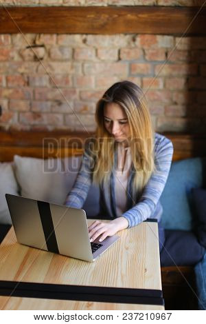 Young Business Woman Went To Cafe After Meeting With Partner, Fair-haired Female Wearing White Blous