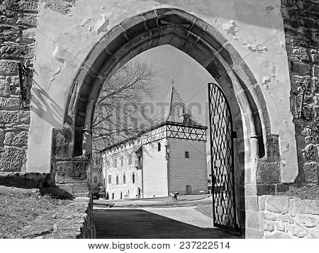 Budyne Nad Ohri, Czech Republic - April 07, 2018: Entrance Gate Leading To Vodni Hrad Castle  At Beg
