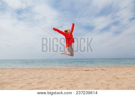 Girl Jumping On A Sandy Beach Sea Shore 1