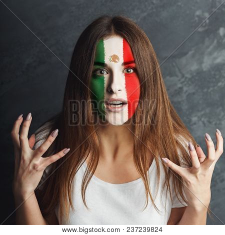 Face Of Young Sad Woman Painted With Flag Of Mexica. Football Or Soccer Team Fan, Sport Event, Facea