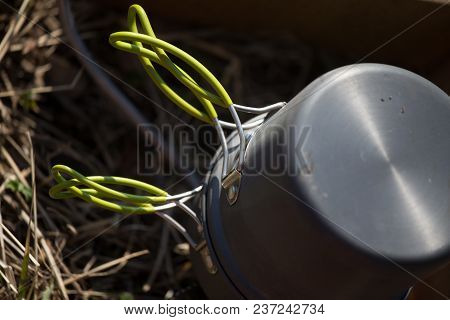 A Closeup Of A Boiling Pot On A Gas Primus Cooking Dinner For Hikers. Outdoors Kitchen.