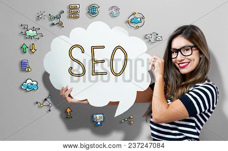 Seo Text With Young Woman Holding A Speech Bubble