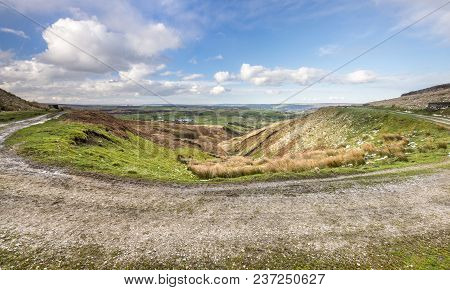 Bridleway In The South Pennines Curving Around A Moorland Scene