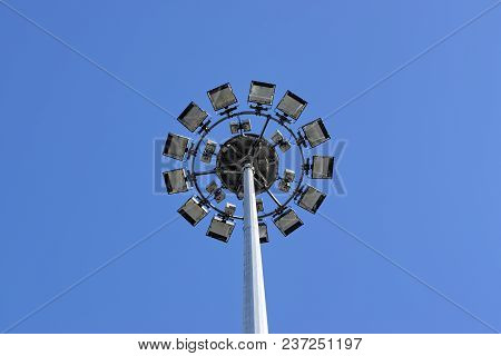 Technology,engineering,modernity And Construction Progress Concept: Modern Steel Pipe Pole With Ligh