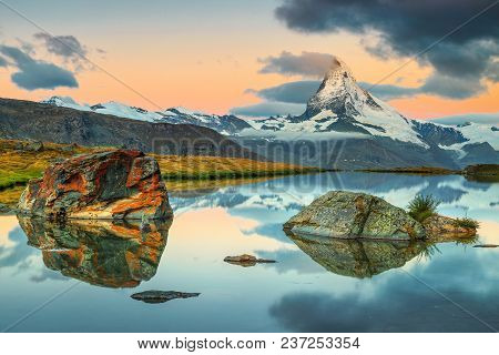 Breathtaking Sunrise Panorama With Famous Matterhorn Peak And Beautiful Alpine Lake, Stellisee, Vala