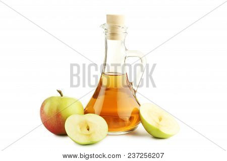 Apple Vinegar In Glass Bottle Isolated On White