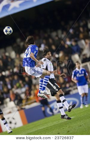 VALENCIA, Spanien - februar 15-#22 Uchida i UEFA Champions League mellem Valencia C.F. vs Sch