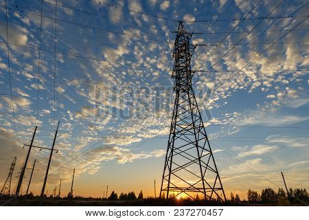 High Voltage Power Line, Power Line Support At Sunset