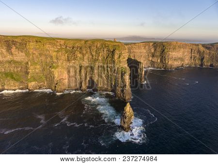 Beautiful Scenic Aerial Drone View Of Ireland Cliffs Of Moher In County Clare. Sunset Over The Cliff