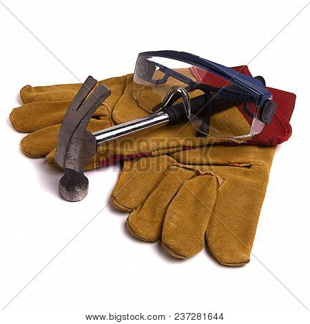 Construction Gloves, Goggles, A Hammer Is Designed To Protect The Health, On A White Background