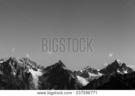 Black And White High Mountains With Glacier And Snow At Summer Day. Caucasus Mountains. Georgia, Reg