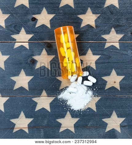 Overhead View Of Prescription Bottle Filled With Generic Opioid Pain Killer Tablets On Rustic Usa Fl