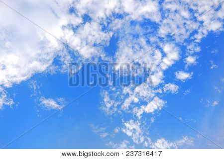 Beautiful Nature Blue Sky With Clouds, Sky Clouds Background, Cloudscape Concept. Space For Text In 