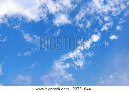 Beautiful Nature Blue Sky With Clouds, Sky Clouds Background, Cloudscape Concept. Space For Text In 