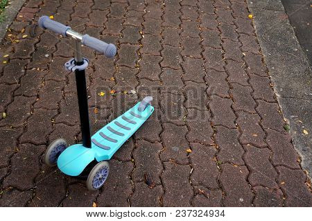 Kick Scooter Standing ,children Scooter In A Park