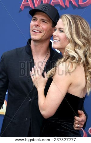 LAS VEGAS - APR 15:  Granger Smith, Amber Bartlett at the Academy of Country Music Awards 2018 at MGM Grand Garden Arena on April 15, 2018 in Las Vegas, NV