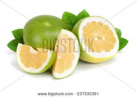 Citrus Sweetie Or Pomelit, Oroblanco With Slices And Leaf Isolated On White Background Close-up.