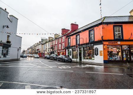 Kenmare, Ireland - November 10, 2017: Commercial Street With Picturesque And Colorful Houses In Kenm