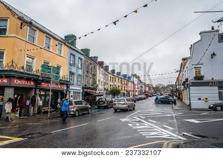 Kenmare, Ireland - November 10, 2017: Commercial Street With Picturesque And Colorful Houses In Kenm
