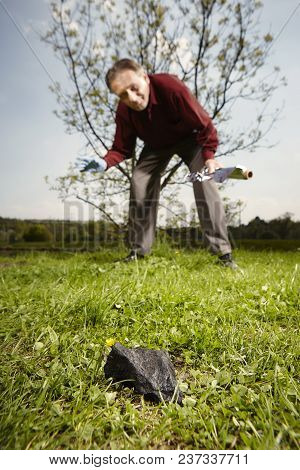 Man Looking For Falling Meteorite Made Happy Find On Spring Meadow
