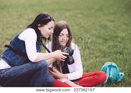 A Professional Photographer Performs His Work