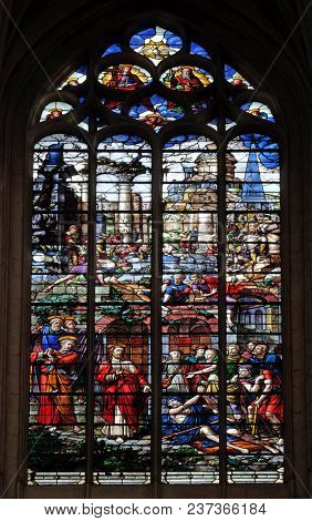 PARIS, FRANCE - JANUARY 11: Healing the paralytic, stained glass window in the Saint Gervais and Saint Protais Church, Paris, France on January 11, 2018.