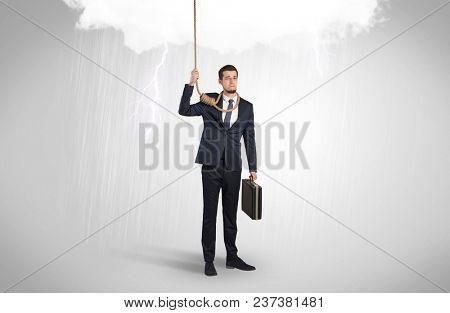 Young businessman trying to suicide with pointing hands concept