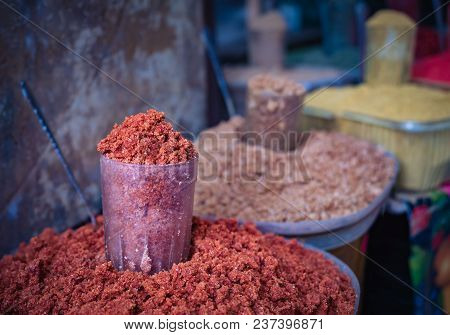 Various Spices From The Street Market. Colorful Georgian Suneli On Glasses In A Row. Oriental Spices