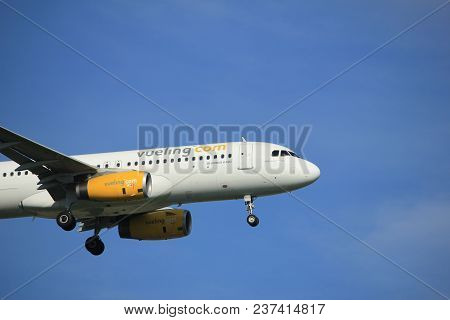 Amsterdam The Netherlands - April, 19th 2018: Ec-mkn Vueling Airbus A320-200 On Final Approach To Sc