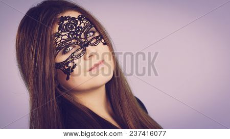 Pretty Mysterious Woman Wearing Black Eye Lace Mask Having Long Brown Hair.